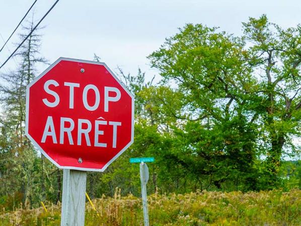 Stop sign in French and English